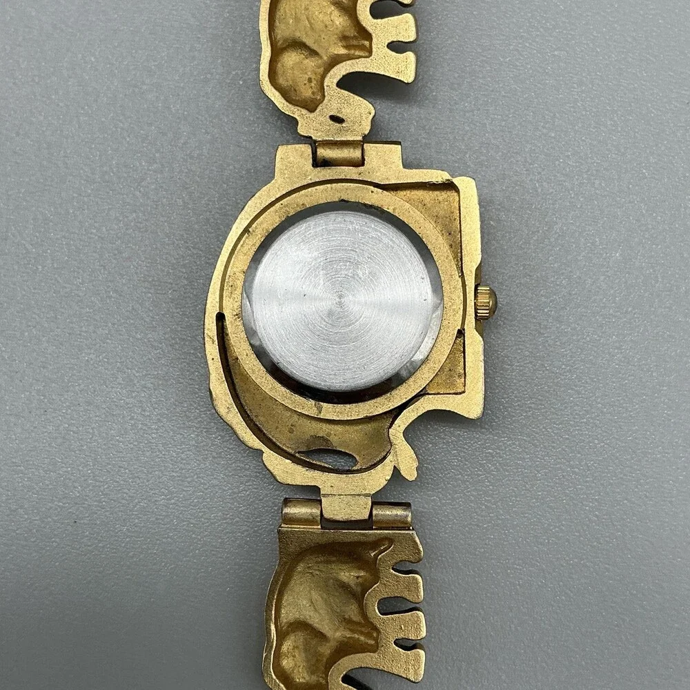 Womens Watch 31mm White Dial Gold Tone Elephant Bracelet New Battery 6.5